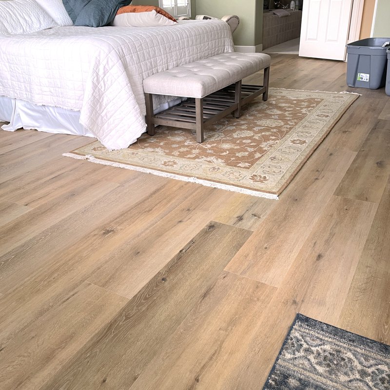 luxury vinyl plank installation in bedroom