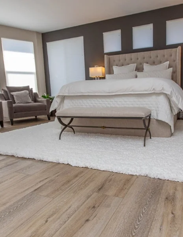 Neutral colors in bedroom with vinyl flooring | Nielson Fine Floors | Lincoln, CA