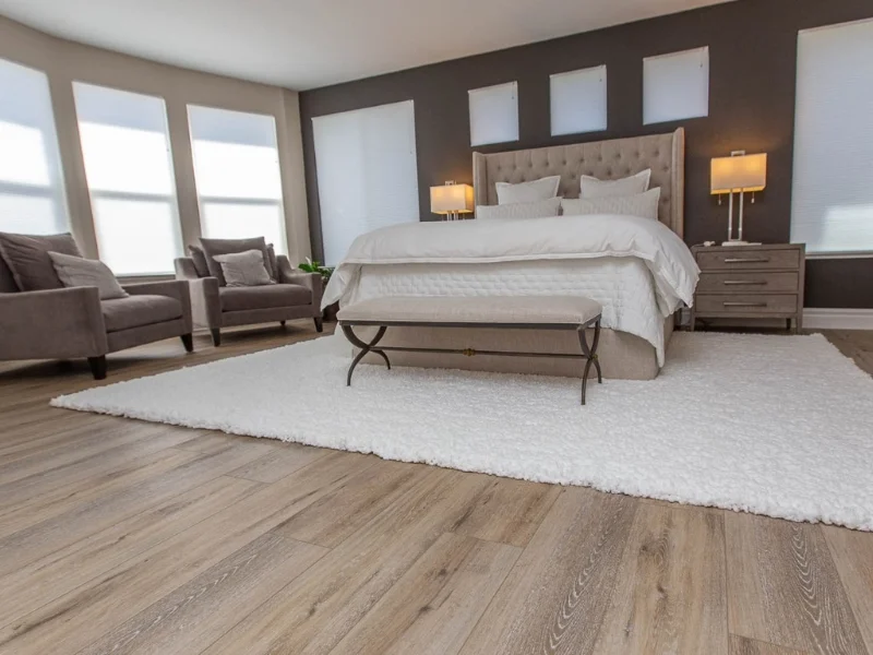 Neutral colors in bedroom with vinyl flooring | Nielson Fine Floors | Lincoln, CA